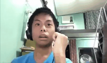 Add text to the Dude Gets Scared and Shoots the TV Screen reaction GIF template in Memesio. Set width, trim the clip, and make a share-ready GIF meme.