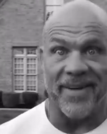 Add text to the Kurt Angle Stare reaction GIF template in Memesio. Set width, trim the 5.0 second clip, and make a share-ready GIF meme.