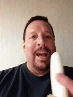 Add text to the Man Sucking Suck Banana reaction GIF template in Memesio. Set width, trim the 4.8 second clip, and make a share-ready GIF meme.