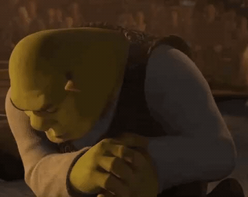 Add text to the Shrek Rizz reaction GIF template in Memesio. Set width, trim the 2.4 second clip, and make a share-ready GIF meme.