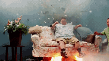 Add text to the Sofa Explosion reaction GIF template in Memesio. Set width, trim the clip, and make a share-ready GIF meme.