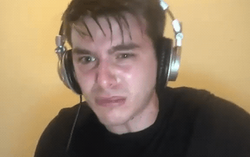Add text to the Sweaty Gamer reaction GIF template in Memesio. Set width, trim the clip, and make a share-ready GIF meme.