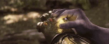 Edit the Thanos Power Up meme GIF in Memesio. Add top and bottom captions, set width, trim the 5.0 second reaction GIF, and make a share-ready meme.