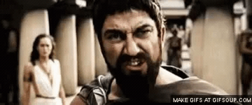 Add text to the This Is Sparta! reaction GIF template in Memesio. Set width, trim the 2.0 second clip, and make a share-ready GIF meme.