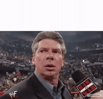 Add text to the Vince McMahon Turning Around reaction GIF template in Memesio. Set width, trim the clip, and make a share-ready GIF meme.