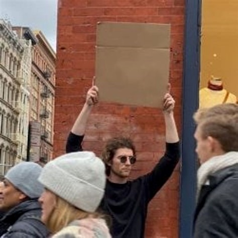 Man with sign, protest
